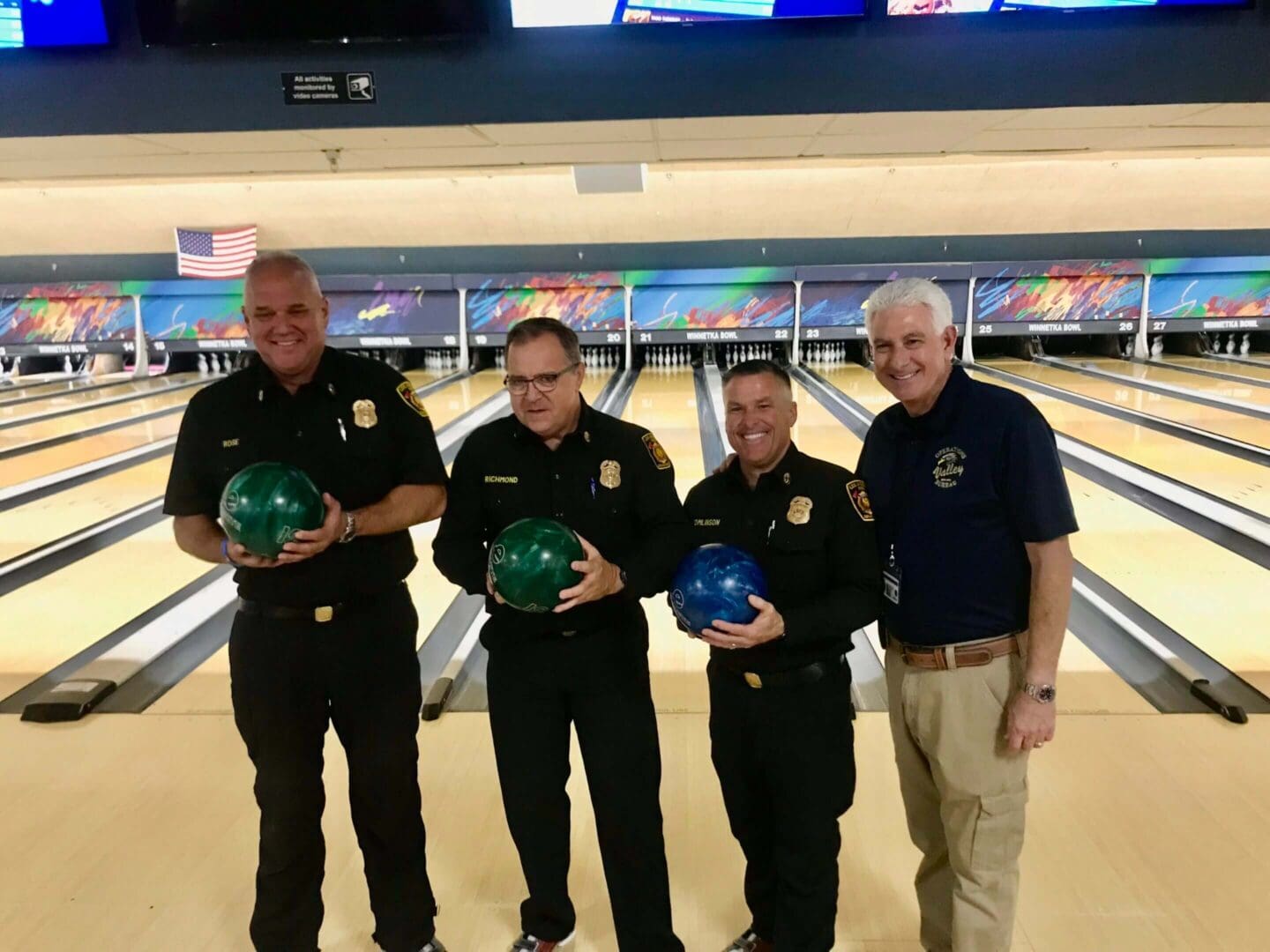 people enjoying Bowling with the brass